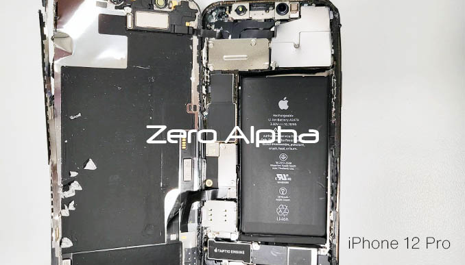 iphone 12 pro opened up showing electronics inside